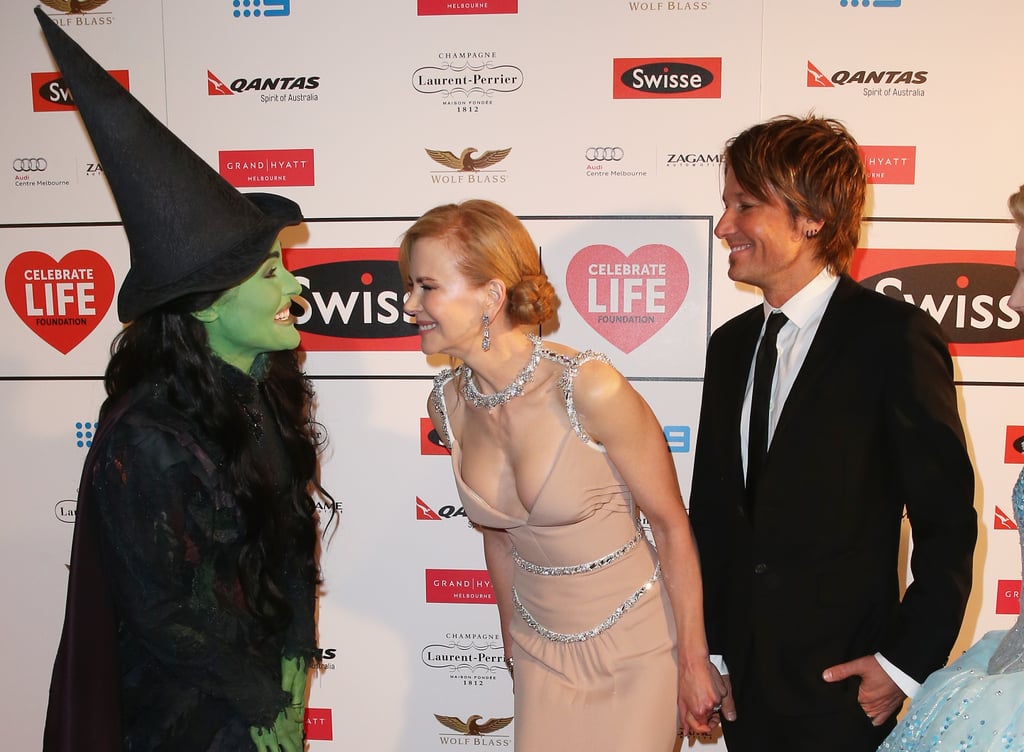 Nicole Kidman and Keith Urban laughed with Jemma Rix, who plays Elphaba in Australia's staging of Wicked, on Friday at the Celebrate Life Ball in Melbourne, Australia.