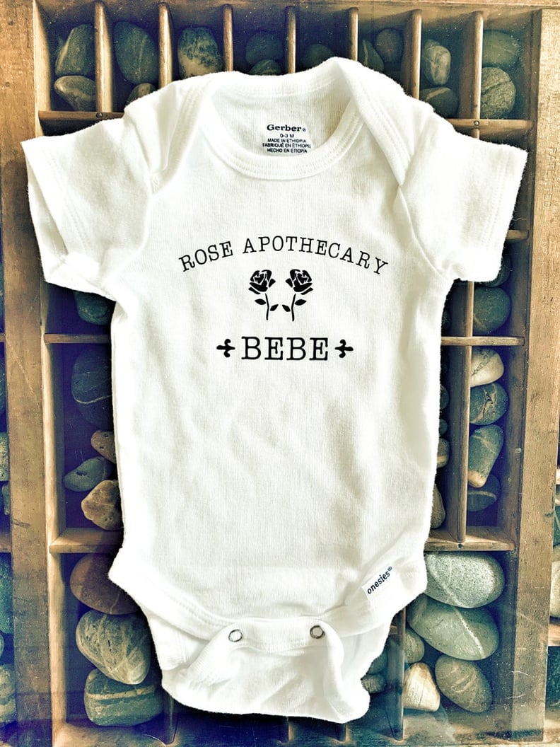 Schitt’s Creek Rose Apothecary Bebe Cotton Baby Snapsuit