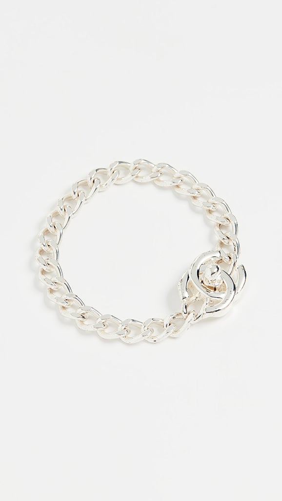 What Goes Around Comes Around Chanel Silver Turnlock Bracelet