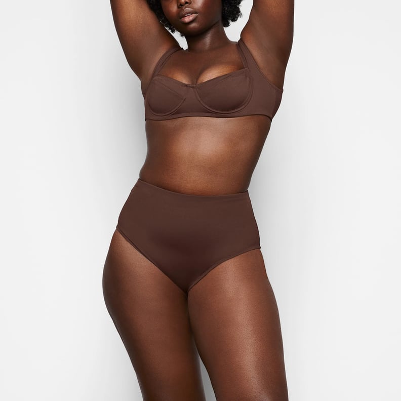 A Bikini Top: Skim Shaping Swim Baneau Bikini Top, Skims's New Collection  Combines Swimwear With Shapewear