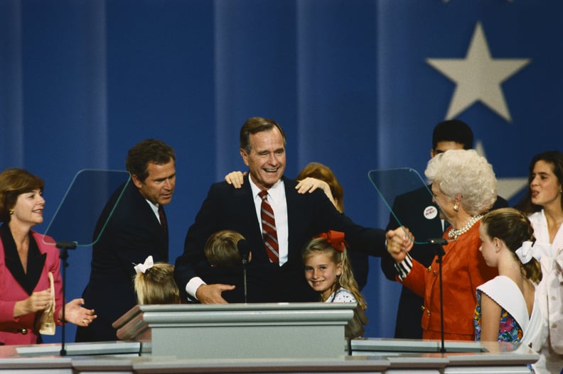 George Bush on the podium at the 1992 Republican National Convention. He is joined by (left to right) daugther-in-law Laura Bush, her husband George W., and her daughter Jenna, an unidentified grandson hugging the President, granddaughter Barbara, wife Ba
