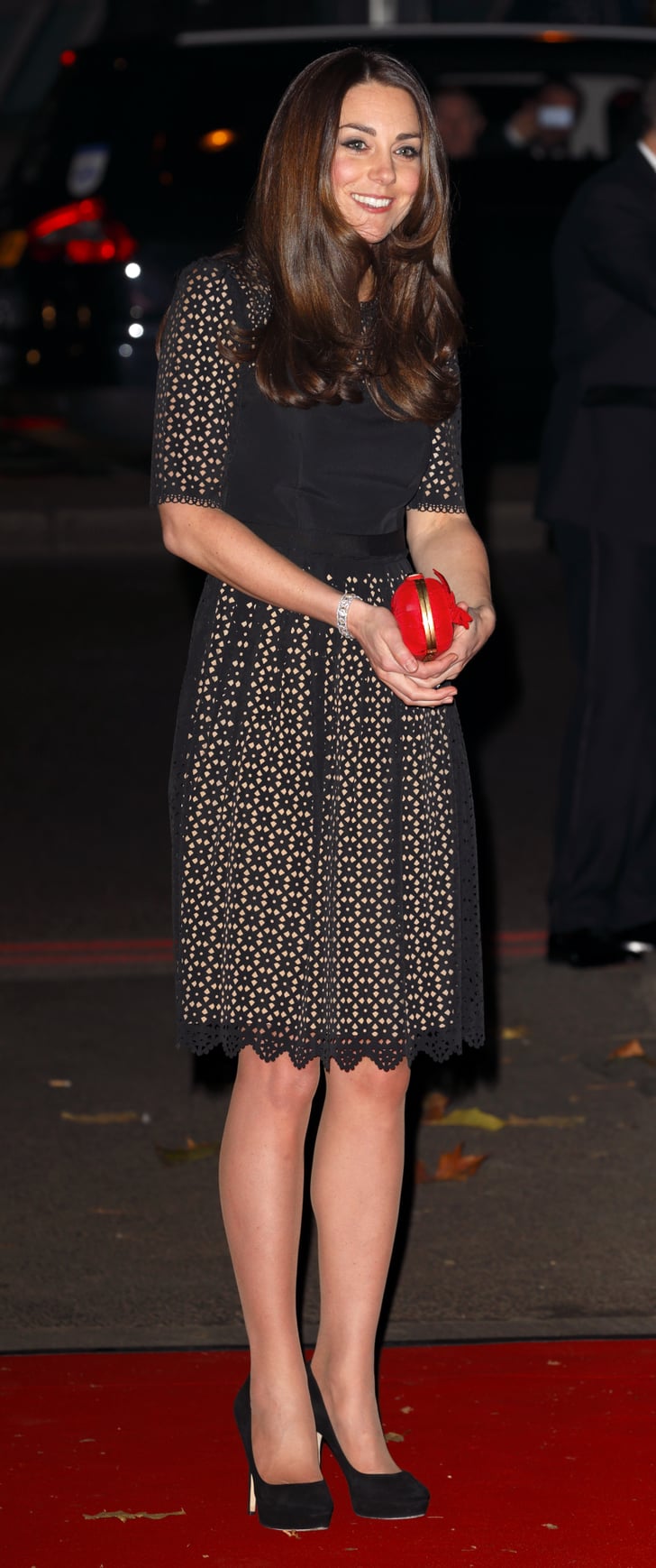 Wearing black Jimmy Choo Cosmic pumps. Kate Middleton Heel Insoles