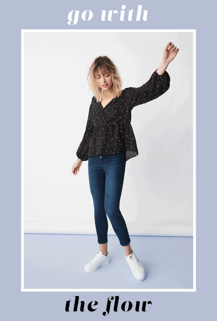 "I'd describe my style as classic with whimsical touches; I gravitate toward fun prints and pops of color, so the delicate heart pattern on this top is calling my name. Combining it with dark denim and white sneakers gives the look a casual-cool vibe that would be perfect for just about any kind of holiday plans. 
"Every December, my friends and I make it our mission to check out all the holiday-themed cocktail bars in NYC, and I know I'd feel good all night long in this outfit. If I wanted to dress it up a touch, I'd add a pair of funky statement earrings and a bold red lip. Plus, I know this outfit would work just as well with a puffer jacket layered on top — a necessity on a cold New York evening!"
— Annalise Mantz Lowenstein, living editor, Native