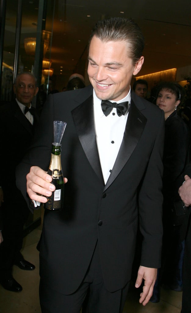 A suited-up Leonardo DiCaprio got ready to pop some bubbly at the Golden Globes in January 2007.