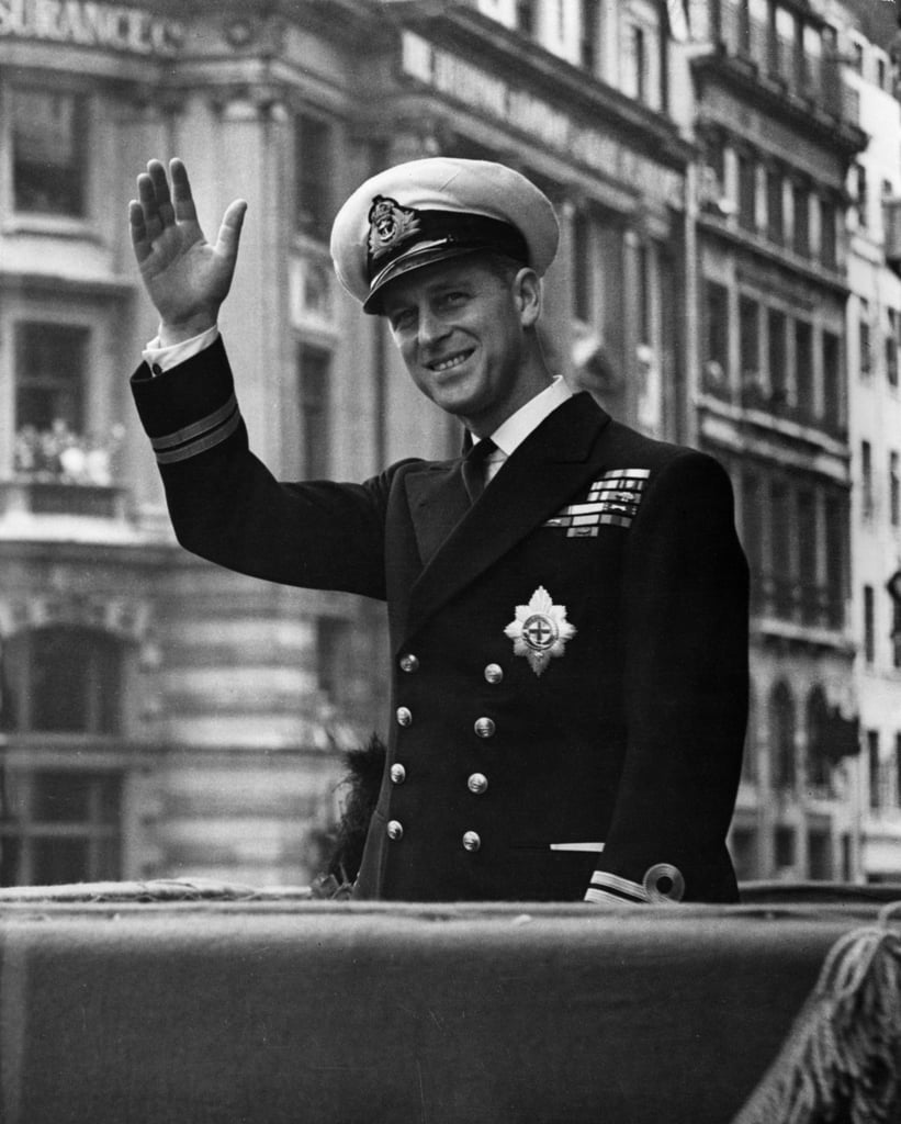 The Duke of Edinburgh waving through the roof of his car in 1948.