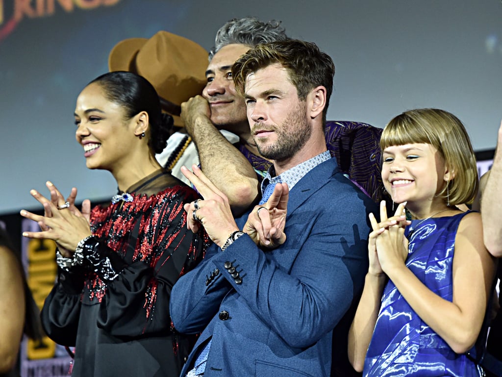 Pictured: Tessa Thompson, Chris Hemsworth, and Lia McHugh at San Diego Comic-Con.