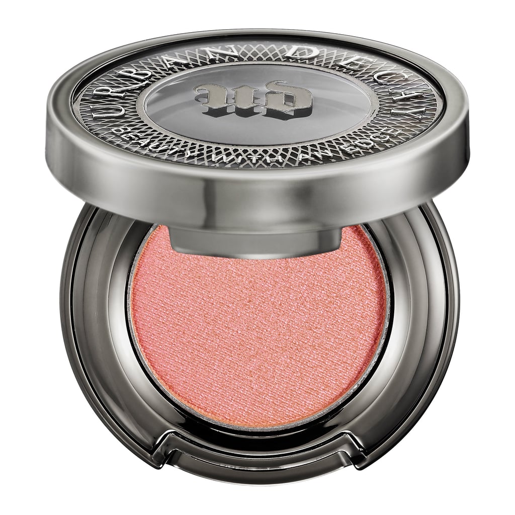 Try a fresh take on the pink-eye trend with a peach-hued eye shadow like Urban Decay Eye Shadow in Fireball ($22). This formula never goes on patchy and will make your eyes sparkle.