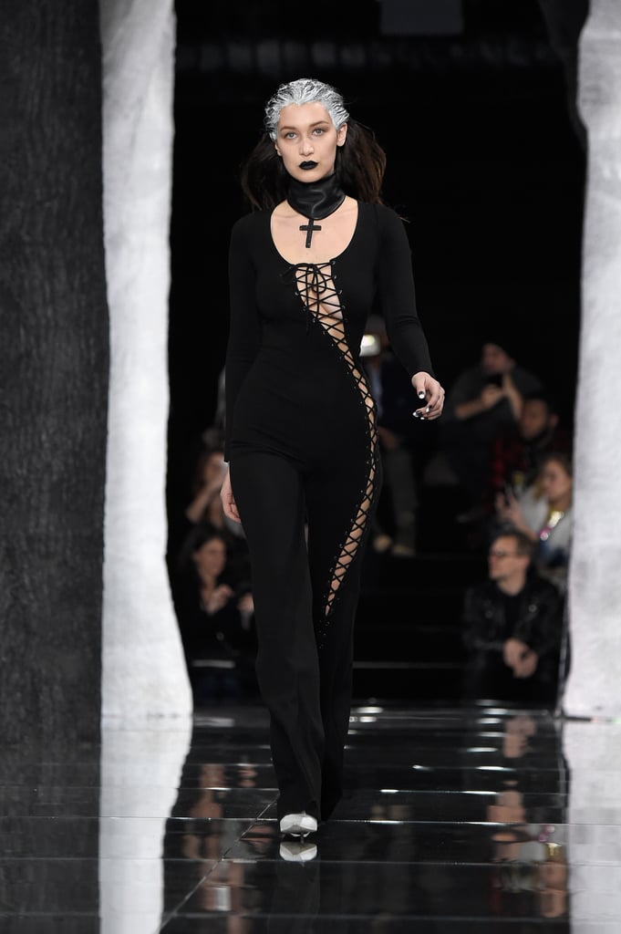 Bella showed off a sexy lace-up jumpsuit and thick leather choker necklace on Rihanna's runway.