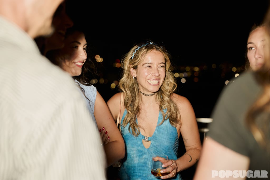 Sarah Wasilak smiles in a group.