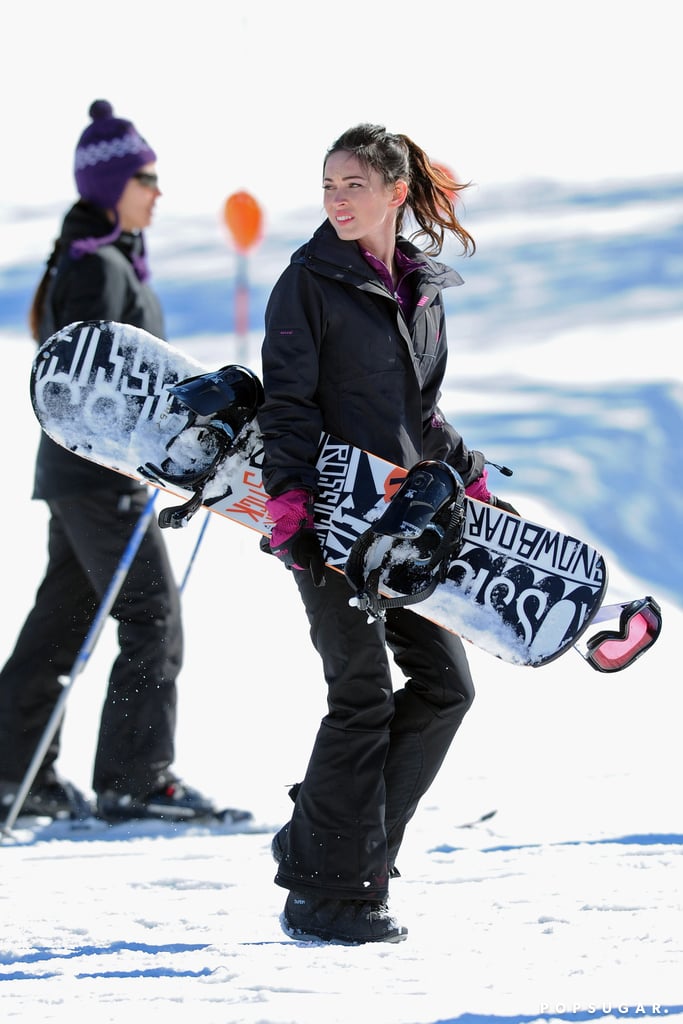 Megan Fox carried a snowboard on the Orange County, NY, set of Friends With Kids in February 2011.