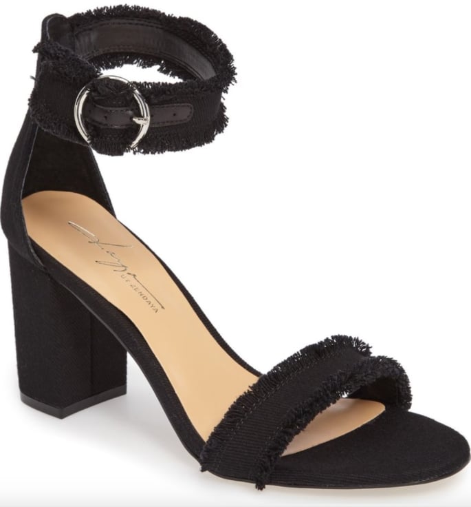 Rock your favorite black denim through the warmer months in the Women's Daya By Zendaya Shasta Fringe Denim Ankle Strap Sandal ($90).