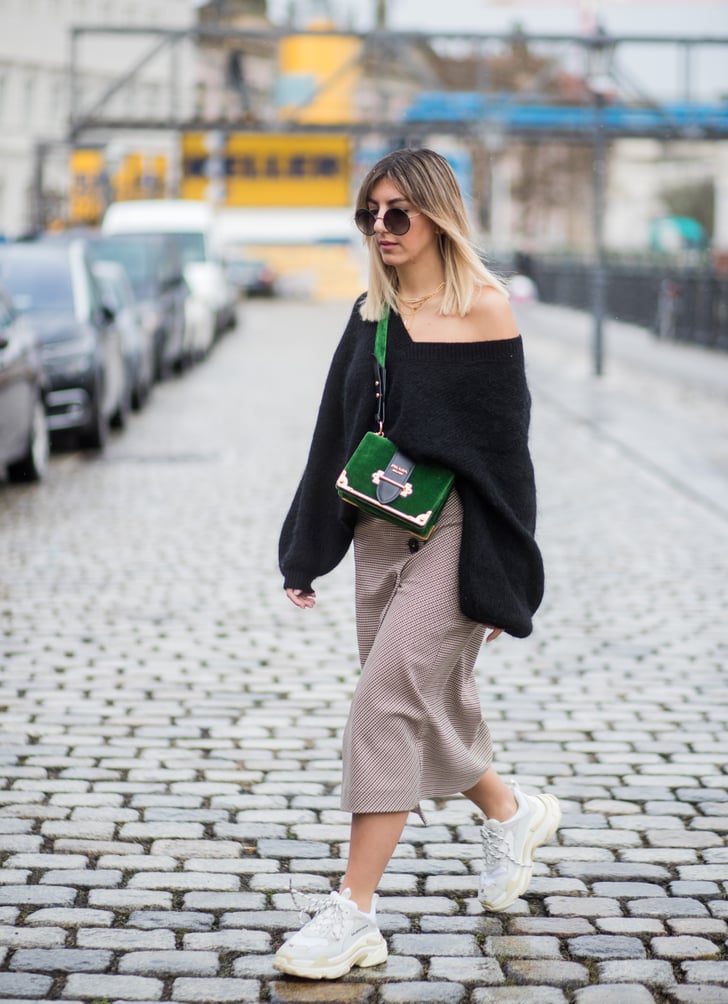 With an Off-the-Shoulder Jumper, a Midi Skirt, and a Crossbody Bag ...