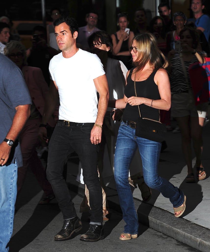 Nothing wrong with a basic black tank and jeans, especially when the fit is spot-on and your significant other's giving off the same laid-back vibe.