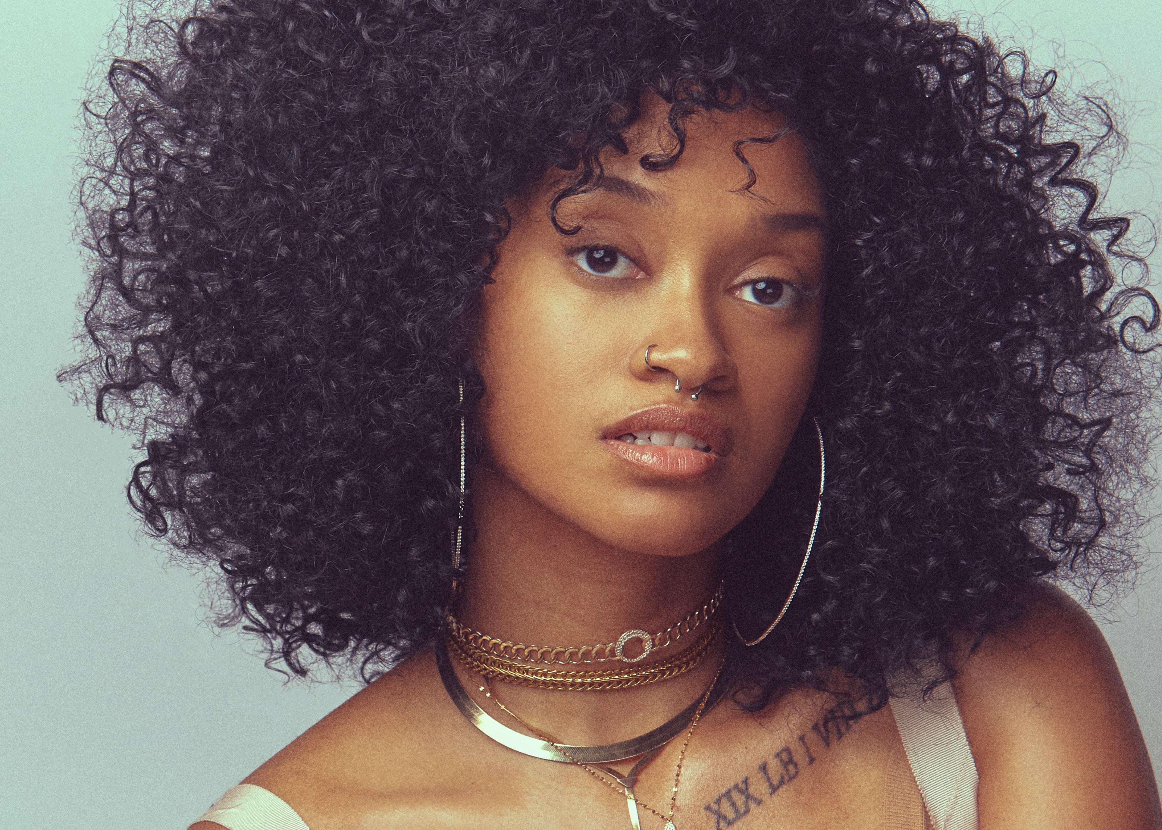 Who Is La Hara Singer Bri Hall? | POPSUGAR Entertainment