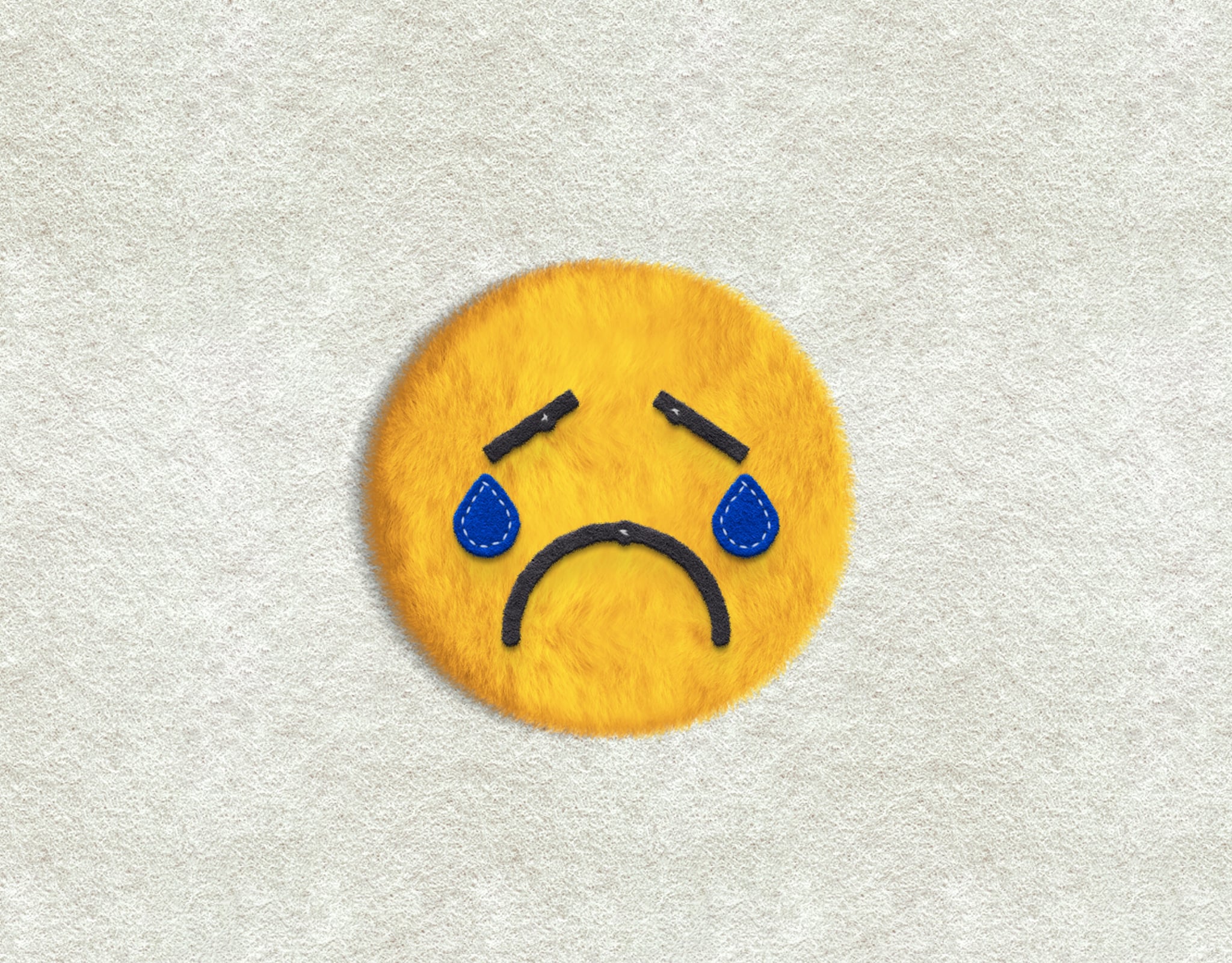 sad felt emoji crying