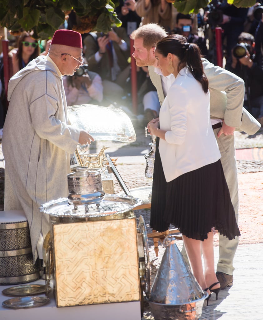 Prince Harry Helping Meghan Markle Fix Her Hair in Morocco