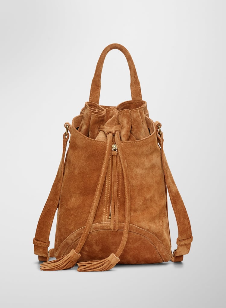The benefit of a great go-with-anything bucket, like this Aritzia Wilfred Free Cindy bag ($350), isn't just having something easy and cool for festival season, but having something sophisticated enough to translate back to your day-to-day once the concert is over, too.
— HM