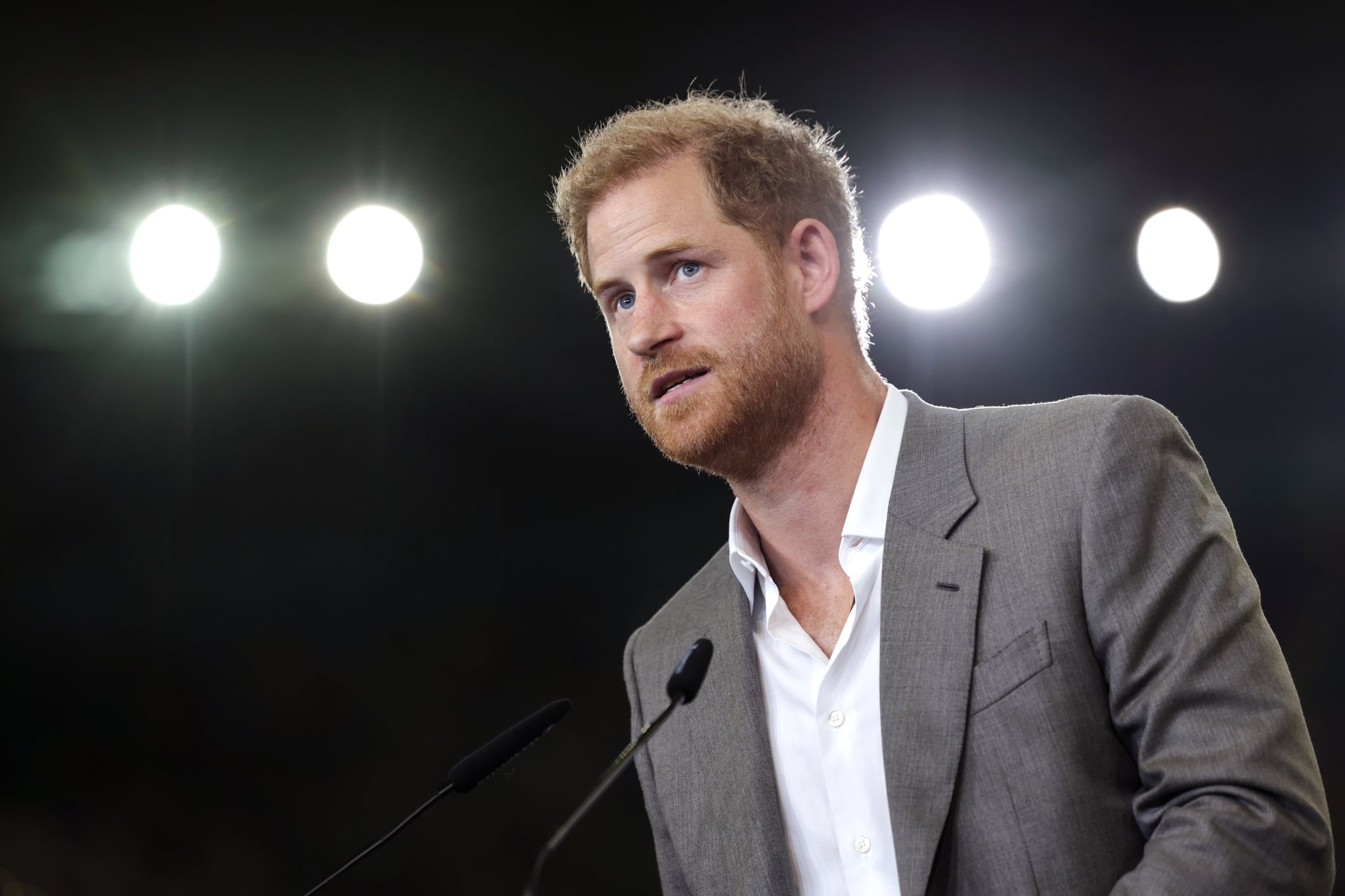 DUSSELDORF, GERMANY - SEPTEMBER 06: Prince Harry, Duke of Sussex speaks on stage during the press conference at the Invictus Games Dusseldorf 2023 - One Year To Go events, on September 06, 2022 in Dusseldorf, Germany. The Invictus Games is an international multi-sport event first held in 2014, for wounded, injured and sick servicemen and women, both serving and veterans. The Games were founded by Prince Harry, Duke of Sussex who's inspiration came from his visit to the Warrior Games in the United States, where he witnessed the ability of sport to help both psychologically and physically. (Photo by Chris Jackson/Getty Images for Invictus Games Dusseldorf 2023)