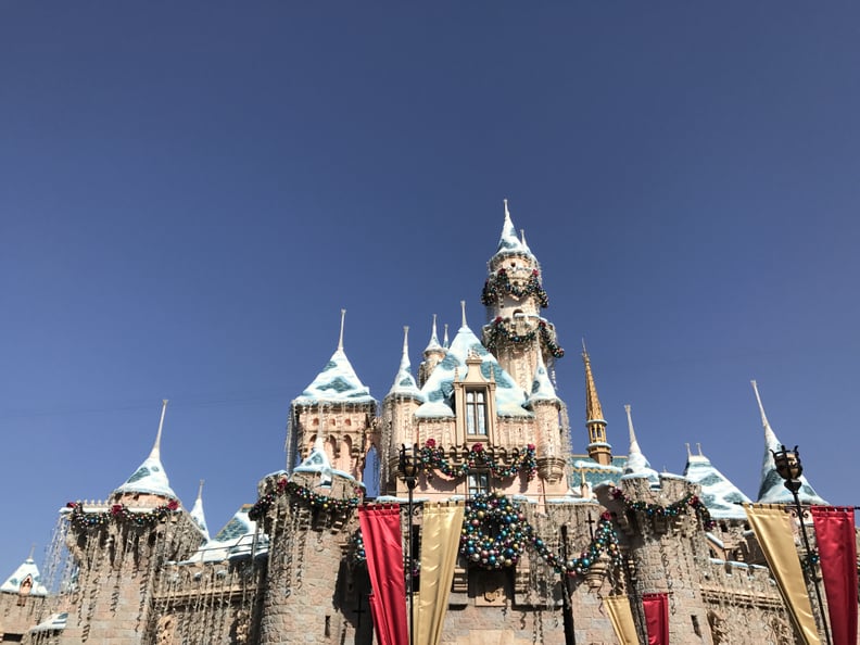 Sleeping Beauty's Castle Dazzles During the Day, and Lights Up Under the "Believe in Holiday Magic" Fireworks at Night.