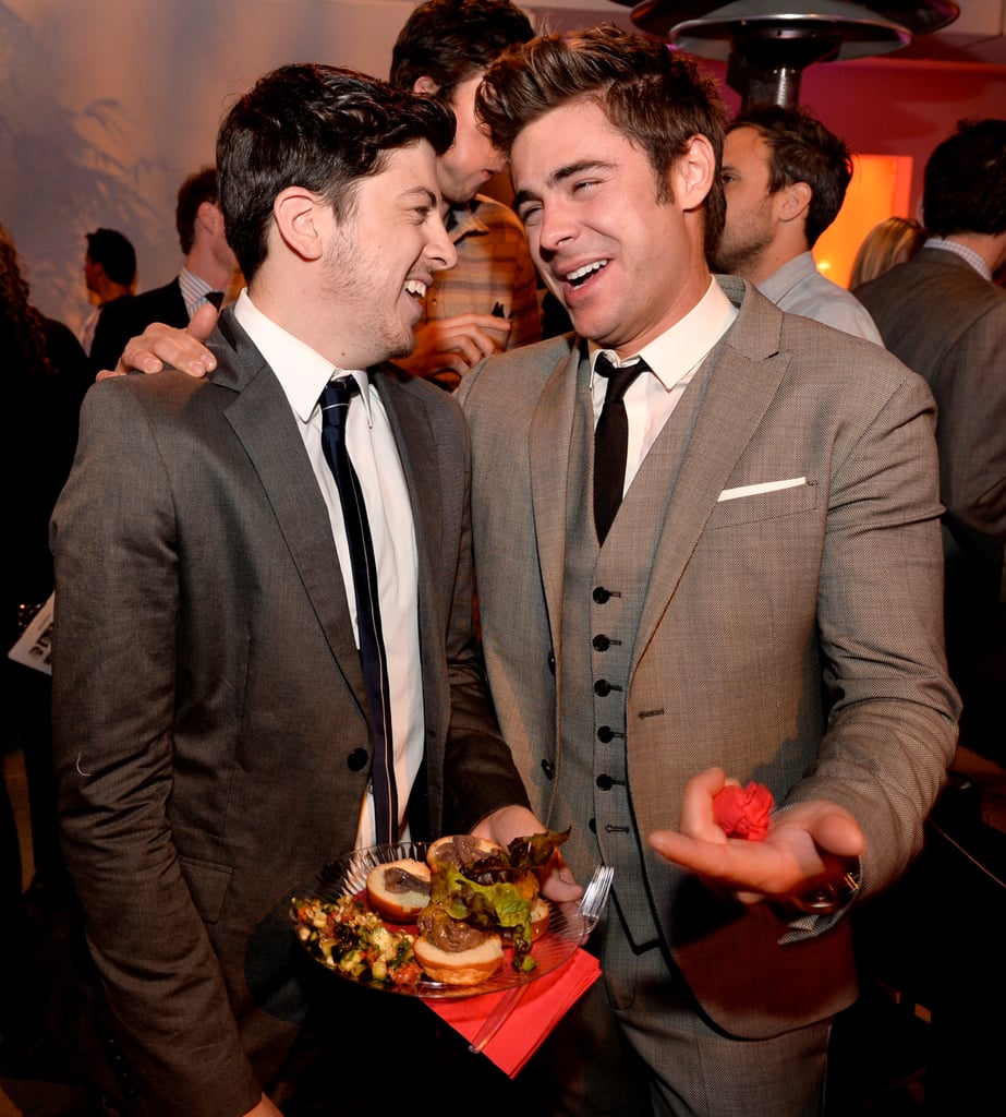At the afterparty, Zac and Chris chowed down on burgers.