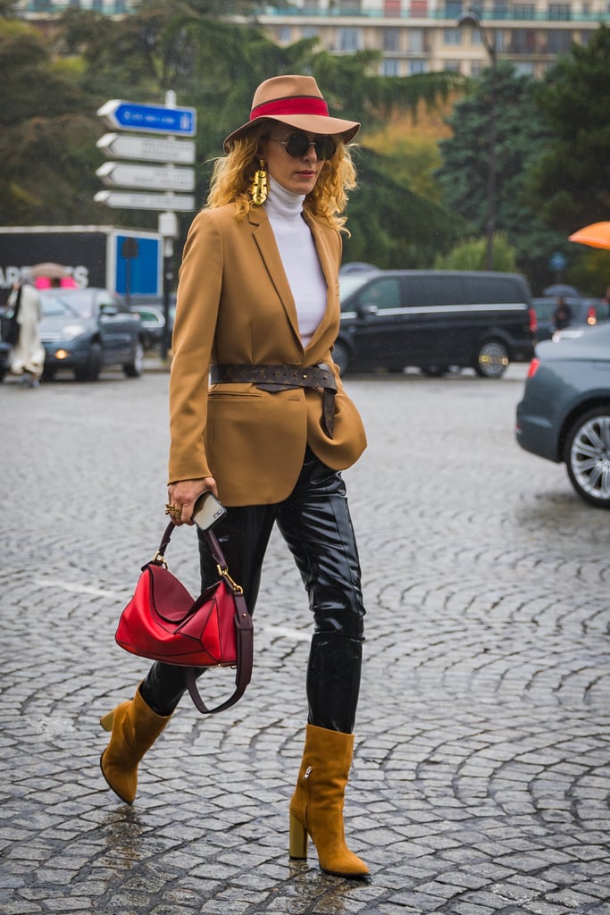 Add all-American polish to your outfit with suede booties, a floppy brim hat, and a belted camel blazer. How "Ralph Lauren" of you.