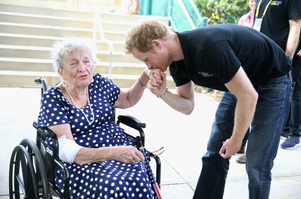 Prince Harry Kissing Elderly Woman's Hand at Invictus Games