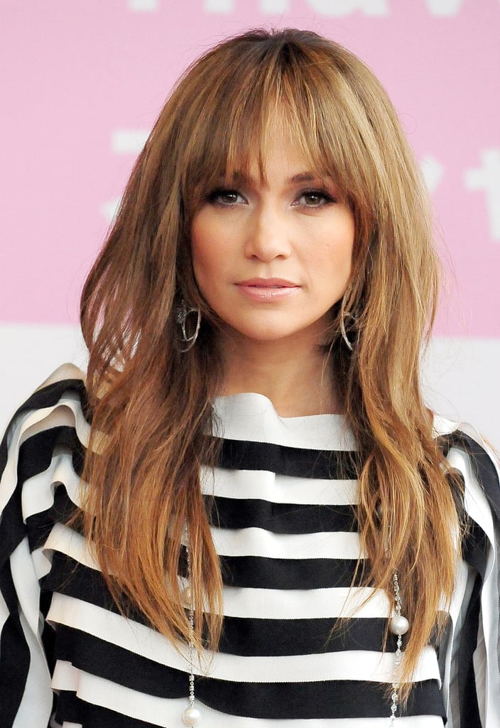 While Jennifer (pictured at a Tokyo event in 2009) usually goes bang-free, fringe looks fabulous on her.