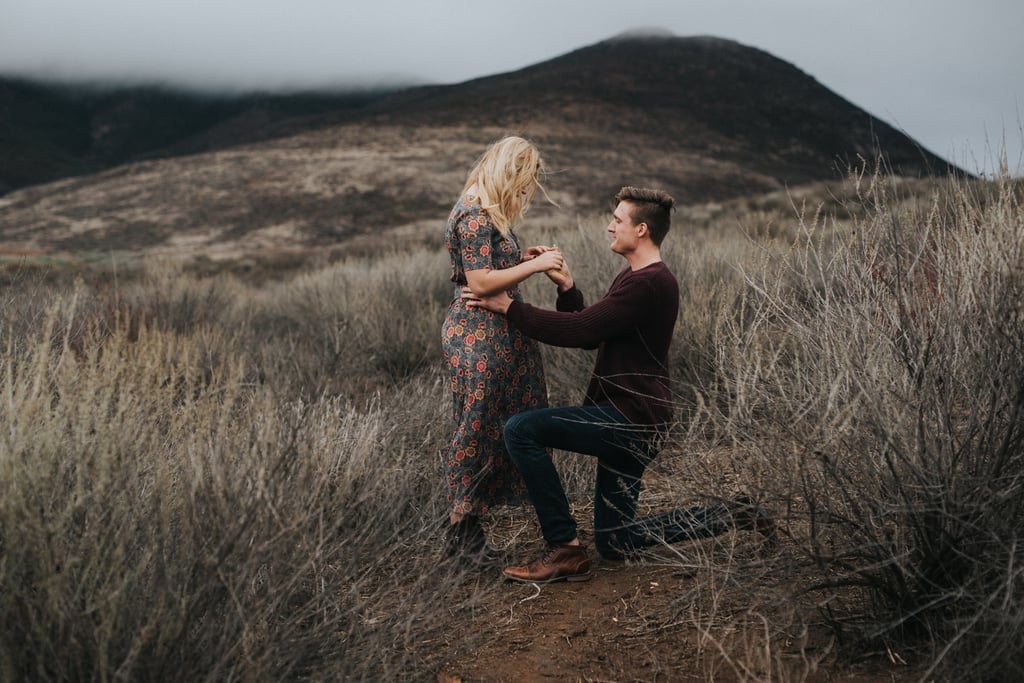 The happy couple complemented each other when it came to their outfits. Hudson wore a deep cranberry sweater, a color that Sasha echoed with her black and red floral-printed dress.
