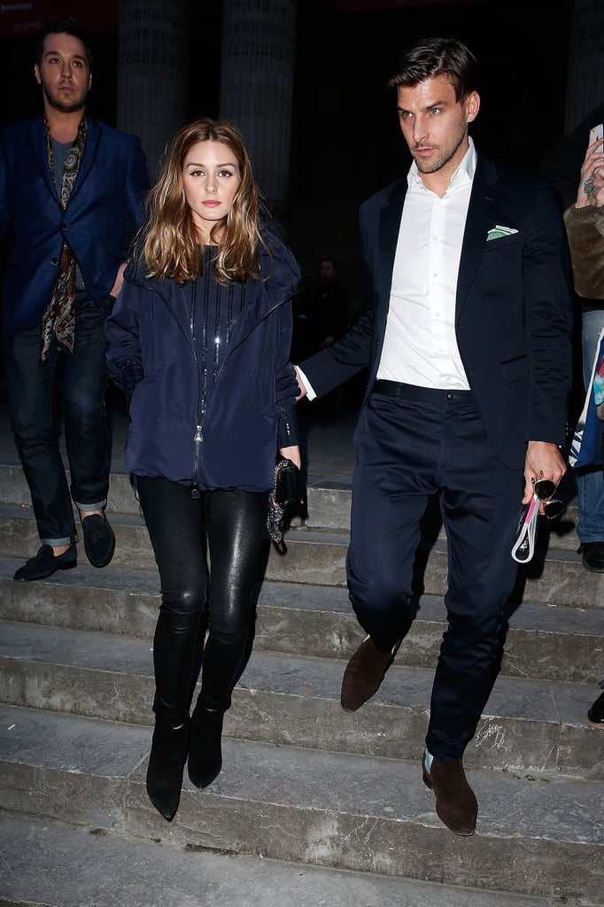 In a surprisingly casual style turn, Olivia arrived with her husband, Johannes Huebl, wearing leather leggings and a sporty zippered jacket, although we could still see a hint of sparkle hiding underneath.