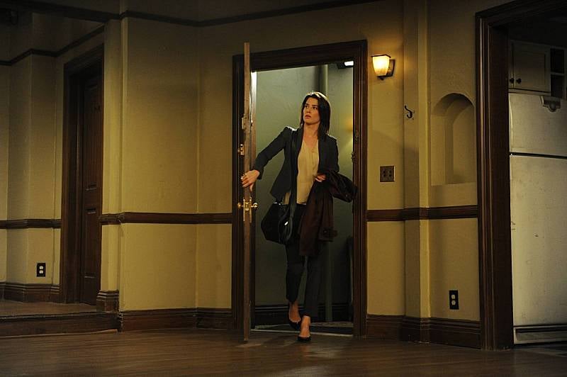 Robin enters the empty apartment. How I Met Your Mother Series Finale