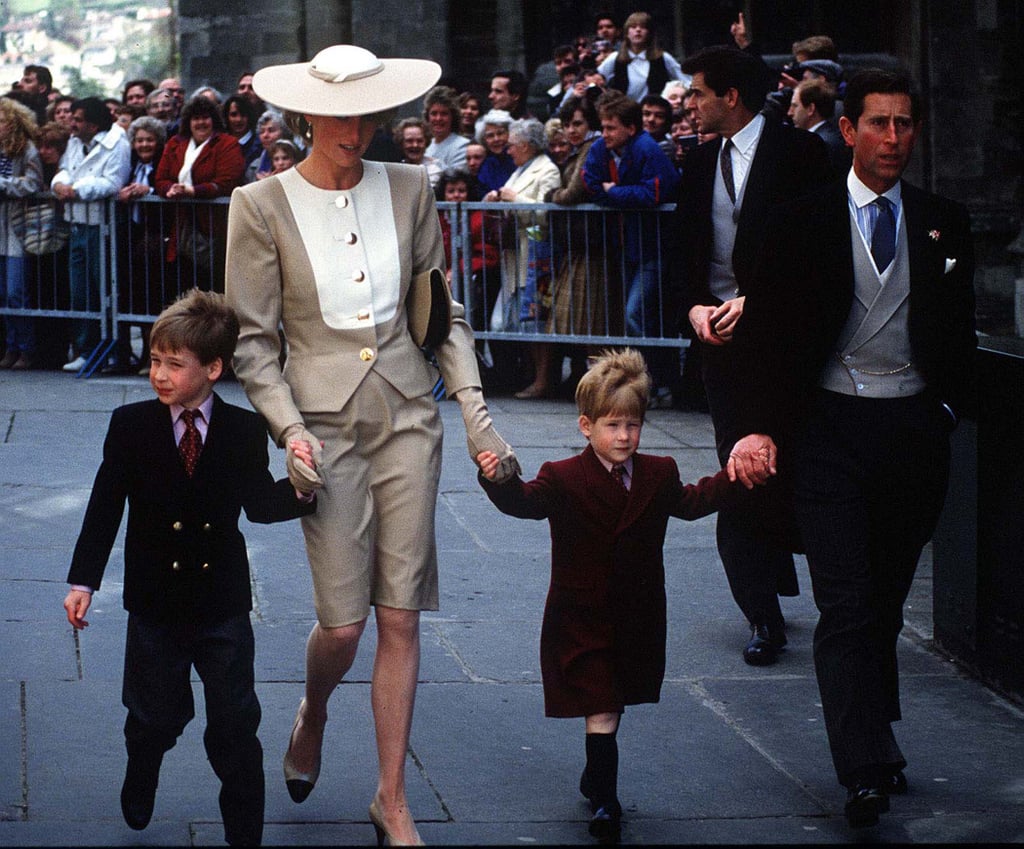 Princess Diana holds both her sons hands as they attend the wedding of the Duke of Hussey's daughter in Bath, England in 1989.