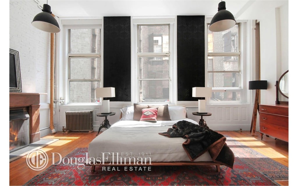 The master bedroom has its own charming fireplace to warm the actor during harsh NYC Winters.