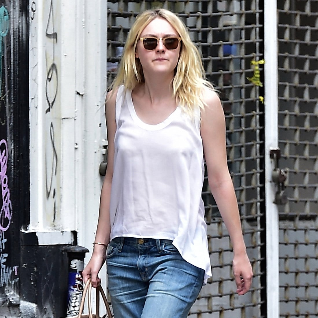 Downtown Cool: Dakota Fanning's Denim Shorts and Fishnets Look for Less -  The Budget Babe