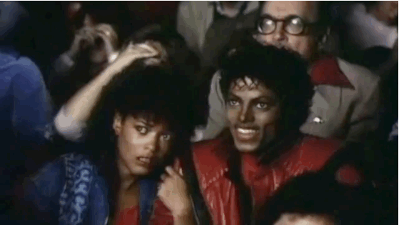 The moment is remarkably similar to this sequence from Michael Jackson's "Thriller" music video, to the point that both he and Sabrina are wearing red jackets and eating popcorn.