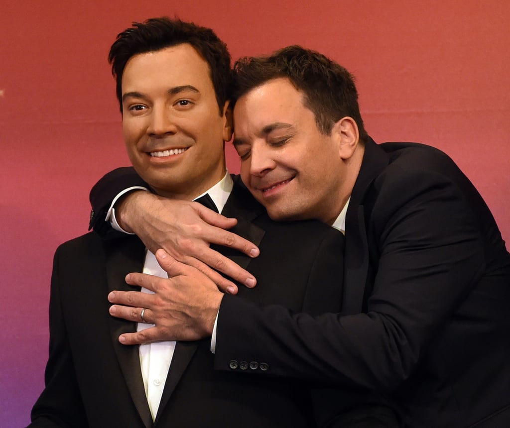Jimmy Fallon cuddled up to his wax figure in NYC on Friday.
