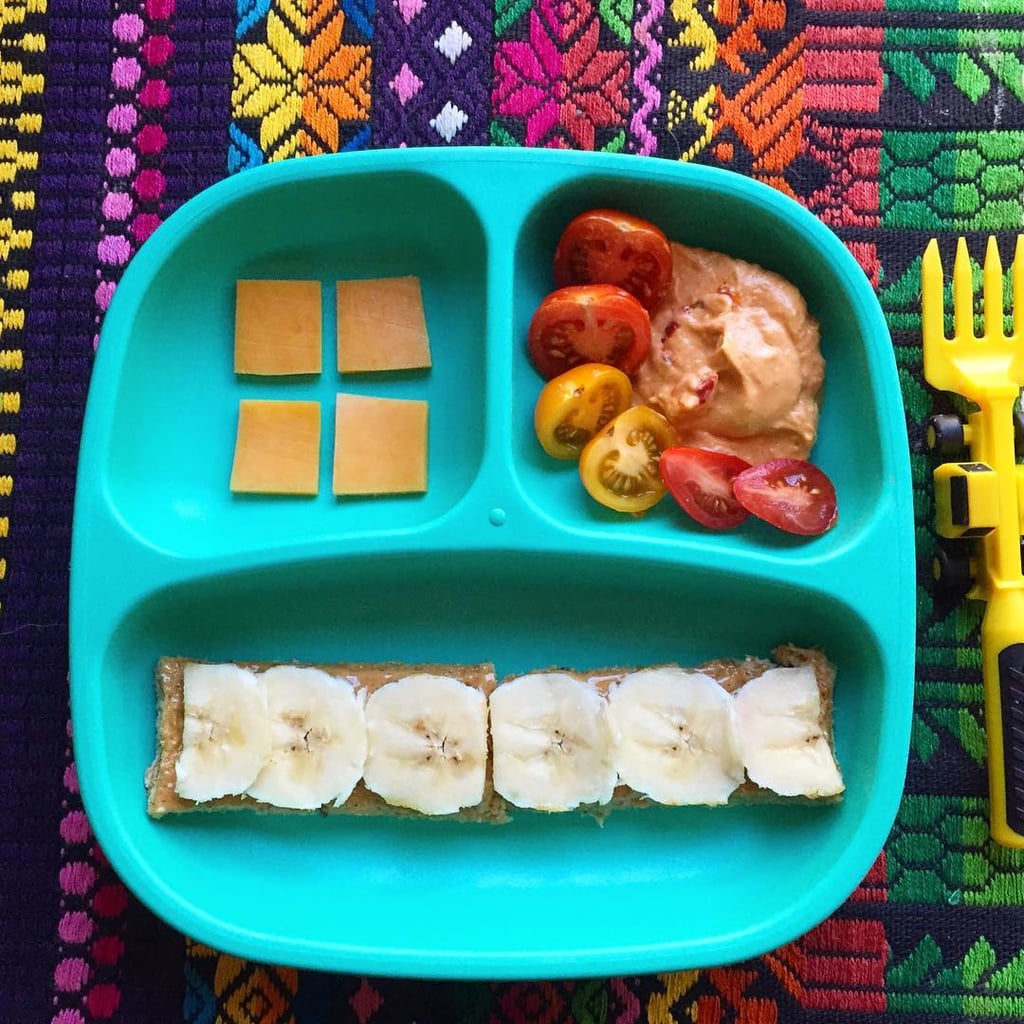 "Lunch: cheddar cheese, roasted red bell pepper hummus with heirloom cherry tomatoes, and sprouted bread with banana and peanut butter."