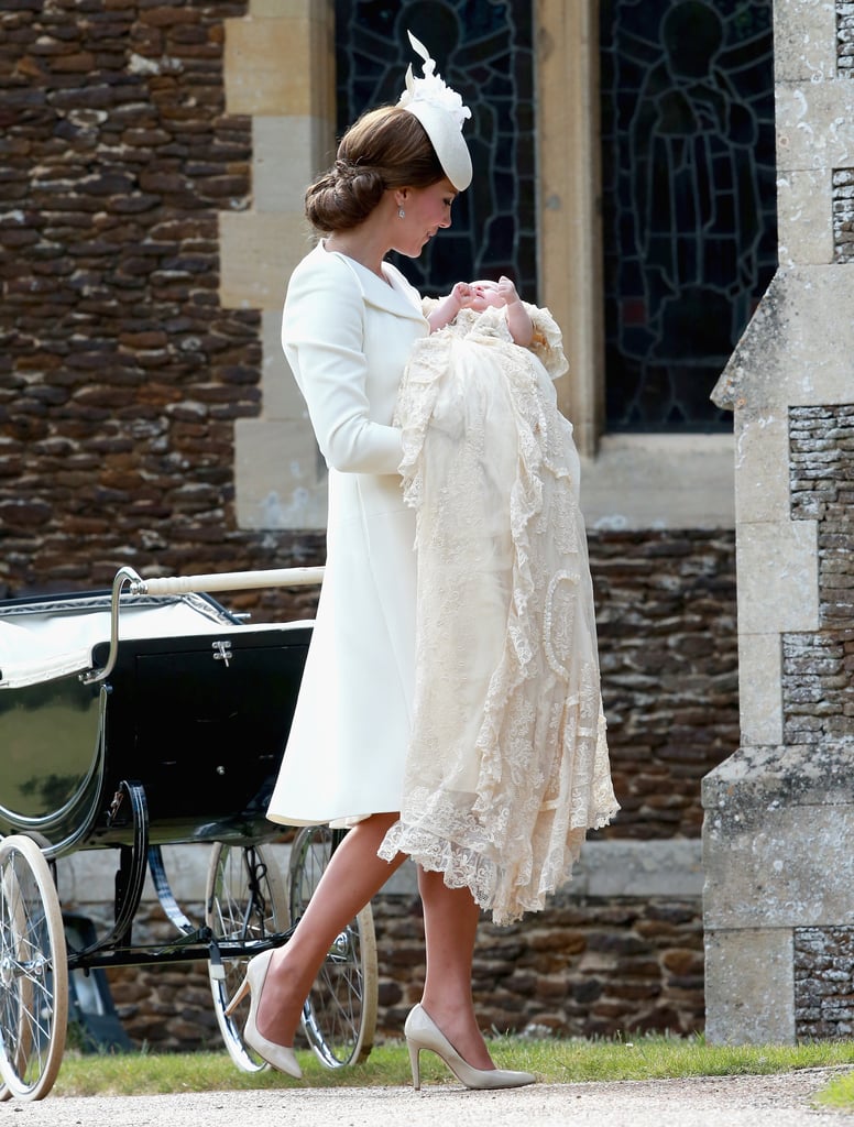 Kate Middleton cradled Princess Charlotte while wearing an all-white look.