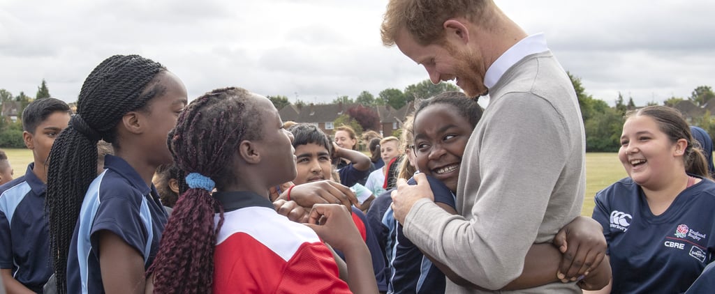 Prince Harry Hugs Kids at Lealands High School