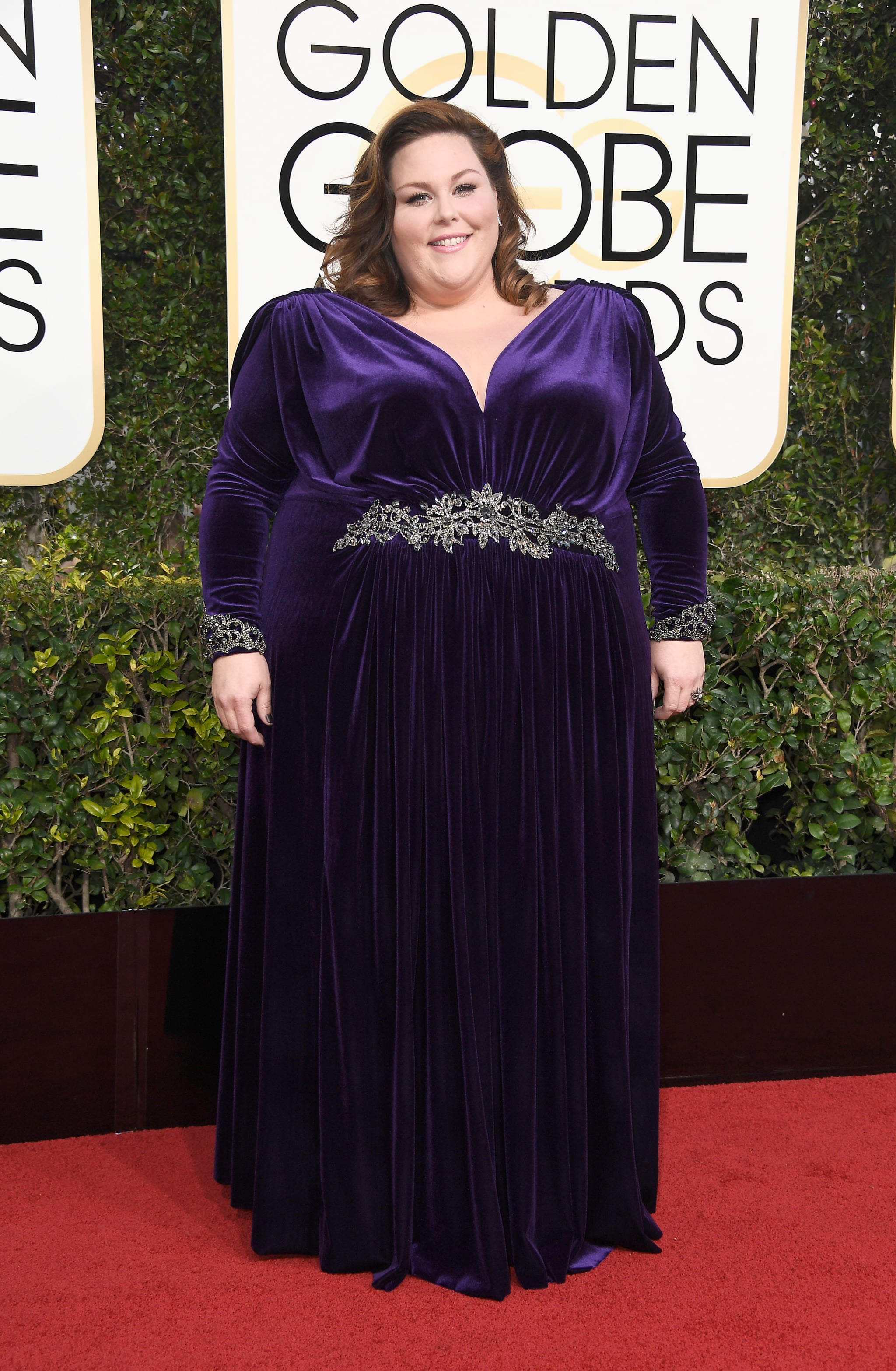Chrissy Metz in a velvet embroidered dress by Nathaniel Paul in