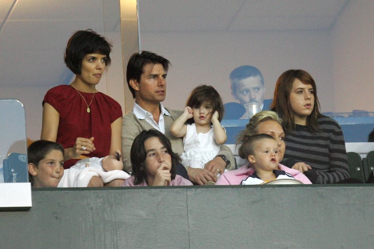 Suri sat with parents Katie and Tom Cruise as well as sister Isabella ...