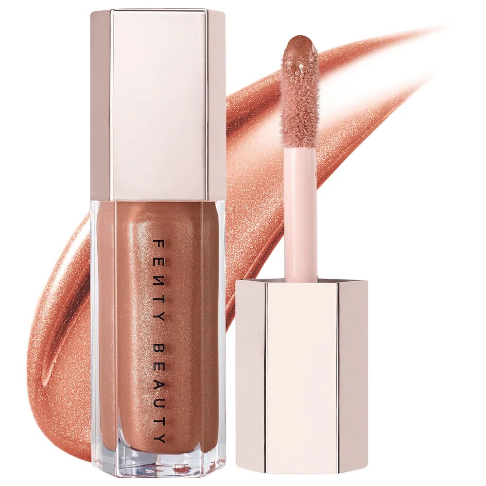 Fenty Beauty by Rihanna Gloss Bomb Lip Gloss ($22)
"Every year, I pick up several lip glosses and give them to the women in my family as stocking stuffers. Fenty Beauty's bestselling gloss is universally flattering, adds the perfect touch of shine, and has a soft peach-vanilla scent that my relatives just love." — Jessica Andrews, senior style director