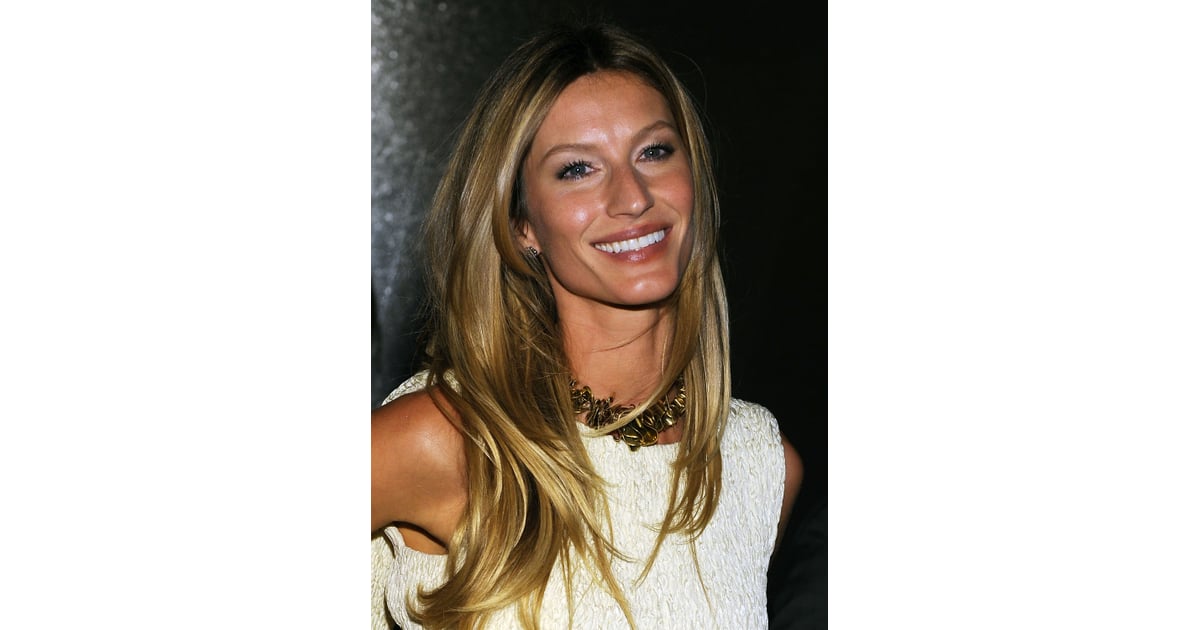 Her Honey Blond Hair Was Cut Into Choppy Layers And Styled