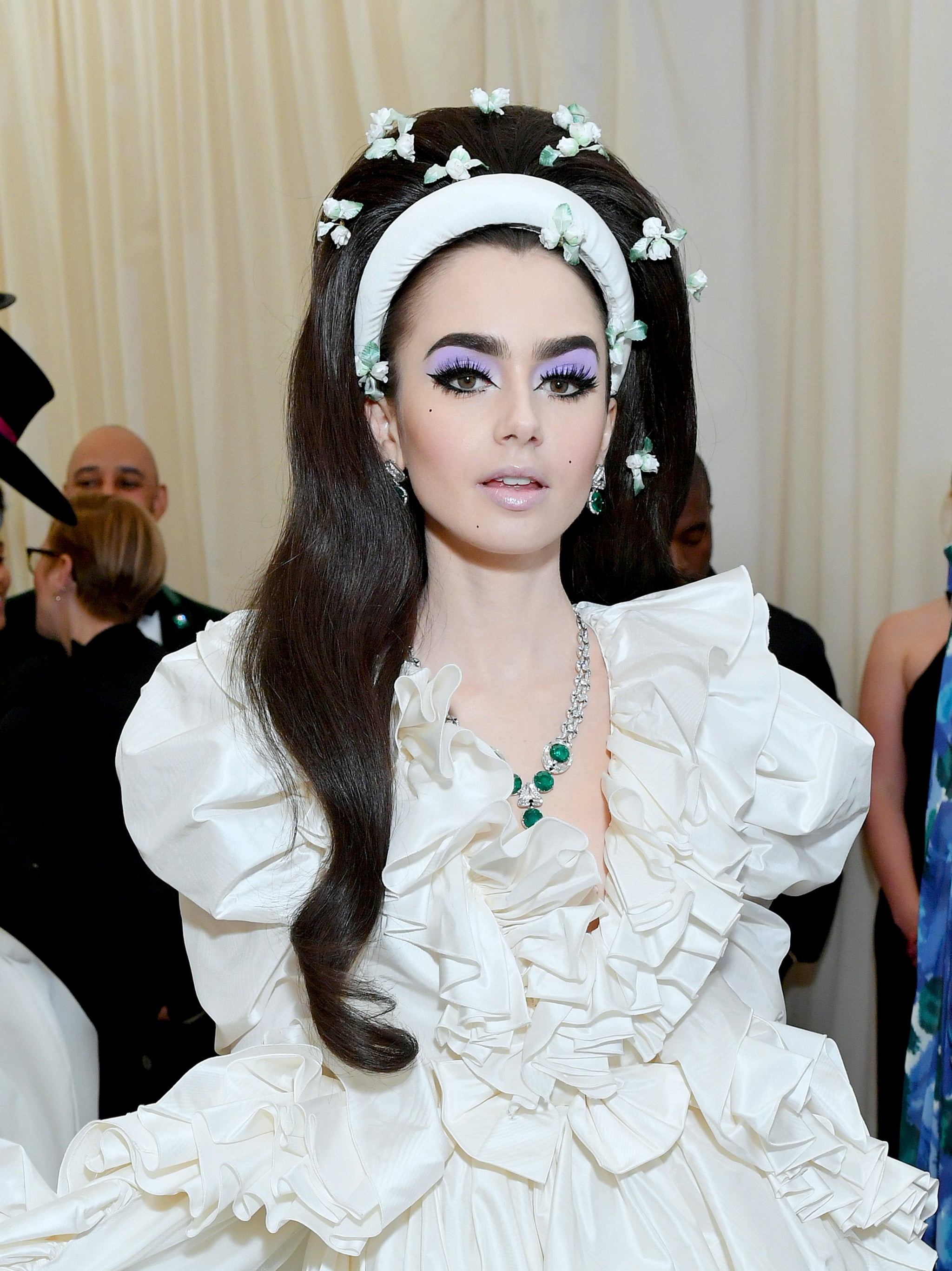 Lily Collins's Lilac Eye Shadow and Floral Hair Accessories at Met Gala | 2019 Was Dominated by Makeup, but These Were the Top Celebrity Looks | POPSUGAR Beauty Photo 5