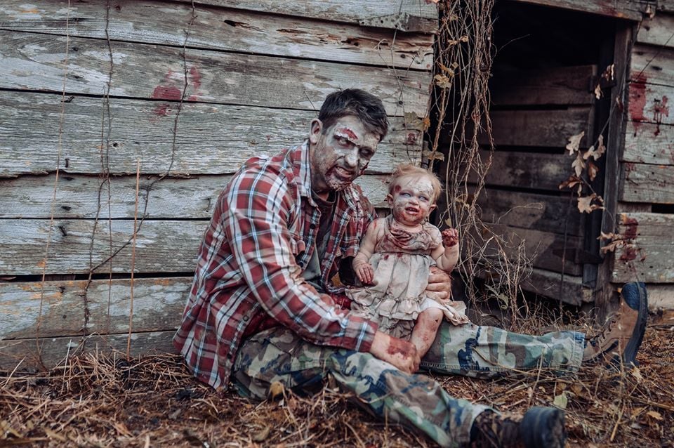 What do you get when you cross zombies from the The Walking Dead with Michael Myers from Halloween? Photographer Tiffany Renfroe's superscary father-daughter photo shoot, which is certainly turning a few heads. Because Tiffany's husband is a huge horror fan, she had the idea to feature him in a zombie photo shoot, knowing he'd love it. The photographer then spent hours shooting and editing the photos, which include the couple's daughter, sharing them just in time for the shoot to go viral before Halloween.
"The inspiration behind the shoot was my husband Daniel and older daughter Kaiden's love for horror movies — specifically the classics — and The Walking Dead," Tiffany told POPSUGAR. "They're counting down until the next season of The Walking Dead is out!"
Related:
Every Alien Fan Will Lose Their Sh*t Looking Through These Scary Maternity Photos
During a trip out to Oregon with her youngest daughter, Oakley, she staged a mom-and-daughter photo session. Once Tiffany returned, Daniel made a crack about how he hadn't had his own full-on photo shoot.
"I wanted to take pictures of just him and Oakley. But I like to be creative, different, and edgy," she said. Because she's an extremely busy full-time labor and delivery nurse, Tiffany knew she had some thinking to do if she wanted to get a Halloween-themed shoot done before the holiday. "Halloween month was in full swing. Daniel was being tagged in multiple Michael Myers posts, and even has a costume he uses to wake the kids up in the morning to be funny," she said. "He wears it to the gym, he makes music videos with it on, so it only made sense to include Michael Myers."
"I loved how good Daniel was at playing dead at the drop of a hat and seeing our three children helping and having fun. The list goes on."
As for the supercreepy shed featured in the photos? The couple simply came across it while cruising around their small hometown of Rehobeth, AL. "We spent a couple days looking for a good location and then we just stumbled upon it," Tiffany said. "It's actually an abandoned pigpen — which makes it even creepier!" Um, yes, I'd say so.
While the results are obviously eye-catching, Tiffany's favorite part of staging the shoot was sneaking in some quality time with her family. "Daniel and I both work full-time jobs, so we value the time we all get together! I also loved all the behind-the-scenes elements that no one sees: the laughing, the mess, the adventure, the snacking, and the kisses," she said. "I loved how good Daniel was at playing dead at the drop of a hat and seeing our three children helping and having fun. The list goes on."
And surprisingly, Tiffany didn't go overboard with insanely creative makeup and colored contacts for Oakley — most of that was done in editing! "The eyes alone required a five-step process on each of them. It took a few hours, but once I would get to the next image, I just couldn't stop," she explained. "I was obsessed with them! I kept going until they were all done."
Keep scrolling to get a look at this creative photo shoot, which includes snaps of one of film's most notorious serial killers "rescuing" the cutest zombie baby we've ever seen. But be warned, some of the pictures are graphic in nature, so make sure there aren't any young kids who might be frightened by them puttering around behind you!
Related:
This Superscary Gender Reveal Will Scare the Absolute Sh*t Out of You What do you get when you cross zombies from the The Walking Dead with Michael Myers from Halloween? Photographer Tiffany Renfroe's superscary father-daughter photo shoot, which is certainly turning a few heads. Because Tiffany's husband is a huge horror fan, she had the idea to feature him in a zombie photo shoot, knowing he'd love it. The photographer then spent hours shooting and editing the photos, which include the couple's daughter, sharing them just in time for the shoot to go viral before Halloween.
"The inspiration behind the shoot was my husband Daniel and older daughter Kaiden's love for horror movies — specifically the classics — and The Walking Dead," Tiffany told POPSUGAR. "They're counting down until the next season of The Walking Dead is out!"
Related:
Every Alien Fan Will Lose Their Sh*t Looking Through These Scary Maternity Photos
During a trip out to Oregon with her youngest daughter, Oakley, she staged a mom-and-daughter photo session. Once Tiffany returned, Daniel made a crack about how he hadn't had his own full-on photo shoot.
"I wanted to take pictures of just him and Oakley. But I like to be creative, different, and edgy," she said. Because she's an extremely busy full-time labor and delivery nurse, Tiffany knew she had some thinking to do if she wanted to get a Halloween-themed shoot done before the holiday. "Halloween month was in full swing. Daniel was being tagged in multiple Michael Myers posts, and even has a costume he uses to wake the kids up in the morning to be funny," she said. "He wears it to the gym, he makes music videos with it on, so it only made sense to include Michael Myers."
"I loved how good Daniel was at playing dead at the drop of a hat and seeing our three children helping and having fun. The list goes on."
As for the supercreepy shed featured in the photos? The couple simply came across it while cruising around their small hometown of Rehobeth, AL. "We spent a couple days looking for a good location and then we just stumbled upon it," Tiffany said. "It's actually an abandoned pigpen — which makes it even creepier!" Um, yes, I'd say so.
While the results are obviously eye-catching, Tiffany's favorite part of staging the shoot was sneaking in some quality time with her family. "Daniel and I both work full-time jobs, so we value the time we all get together! I also loved all the behind-the-scenes elements that no one sees: the laughing, the mess, the adventure, the snacking, and the kisses," she said. "I loved how good Daniel was at playing dead at the drop of a hat and seeing our three children helping and having fun. The list goes on."
And surprisingly, Tiffany didn't go overboard with insanely creative makeup and colored contacts for Oakley — most of that was done in editing! "The eyes alone required a five-step process on each of them. It took a few hours, but once I would get to the next image, I just couldn't stop," she explained. "I was obsessed with them! I kept going until they were all done."
Keep scrolling to get a look at this creative photo shoot, which includes snaps of one of film's most notorious serial killers "rescuing" the cutest zombie baby we've ever seen. But be warned, some of the pictures are graphic in nature, so make sure there aren't any young kids who might be frightened by them puttering around behind you!
Related:
This Superscary Gender Reveal Will Scare the Absolute Sh*t Out of You