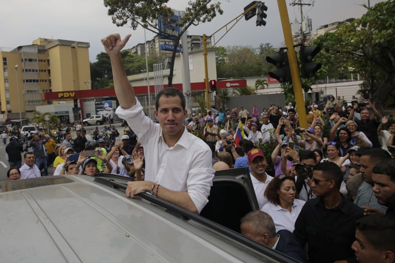 CARACAS, VENEZUELA - APRIL 10: Venezuelan opposition leader Juan Guaido, recognized by many members of the international community as the country's rightful interim ruler, greets people during a rally on April 10, 2019 in Caracas, Venezuela. During his sp