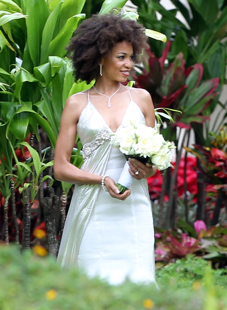 Guitar legend Carlos Santana, 63, married fiancée Cindy Blackman, 51, in Maui on Sunday! She posed outside with her bridesmaids, though inclement weather moved their actual ceremony from the beach to an indoor venue. The bride is also a successful musician, and their love story played out on stage during one of his shows over the Summer. Carlos proposed to Cindy in July during a concert right after her drum solo. It's Carlos's second wife after his divorce three years ago. It's been a huge year for celebrity weddings, and it's time to add another set of newlyweds to the list. Congrats to Carlos and Cindy!