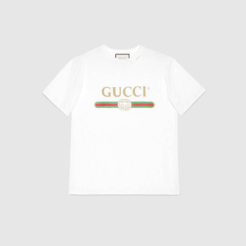 "OK, I'll be the first one to admit that I have a problem with hoarding white t-shirts, so you'll have to excuse me for wanting to add this Gucci Print Cotton T-Shirt ($550) to my collection. Plus, this vintage Gucci logo tee has already become a celebrity staple." — Nikita Ramsinghani, assistant editor, Fashion