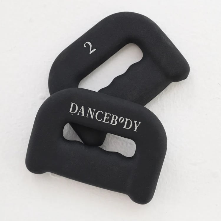 2lb Dancebody Weights ($35)
"I've been using these two-pound weights in my Saturday prenatal yoga-Pilates fusion class. These are the perfect addition to help sculpt my arms, allowing me to maintain low resistance but reach high repetitions. I also love the D-shape of the weights, making them super easy to grip!" — Alexis Jones, health and fitness section lead