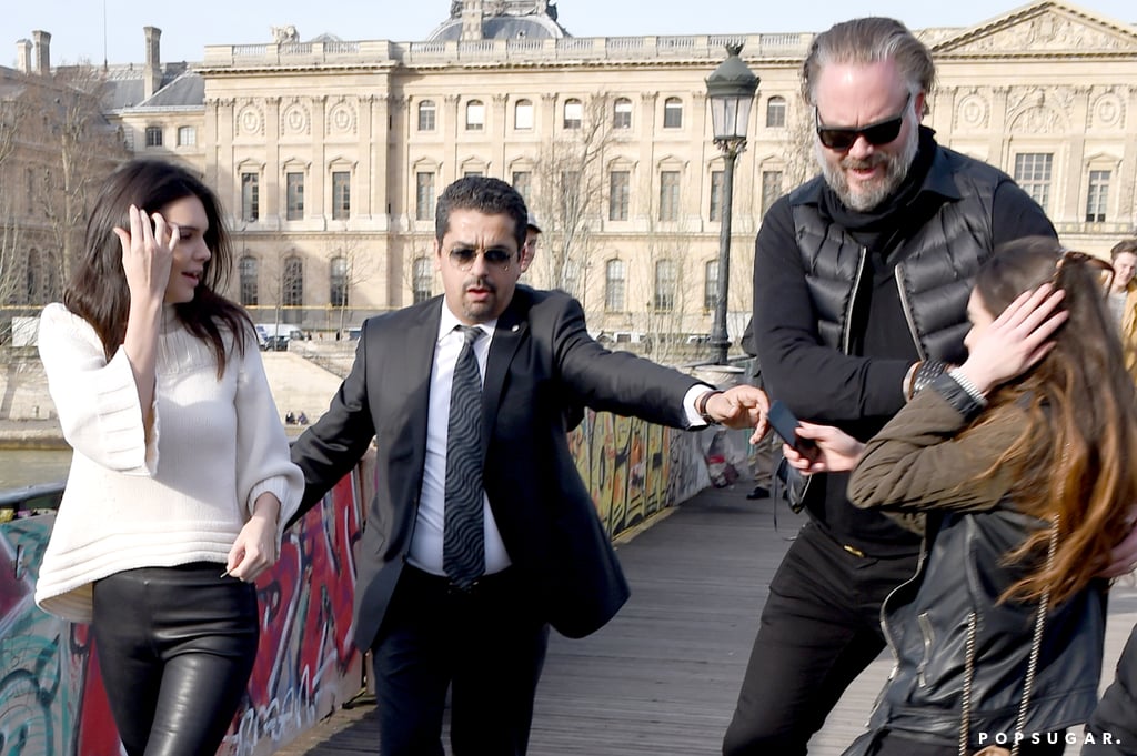 Fan Tries Kissing Kendall Jenner in Paris | Pictures