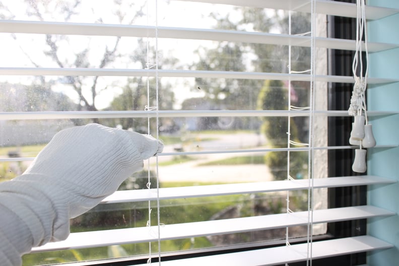 Dust the Blinds Using a Sock